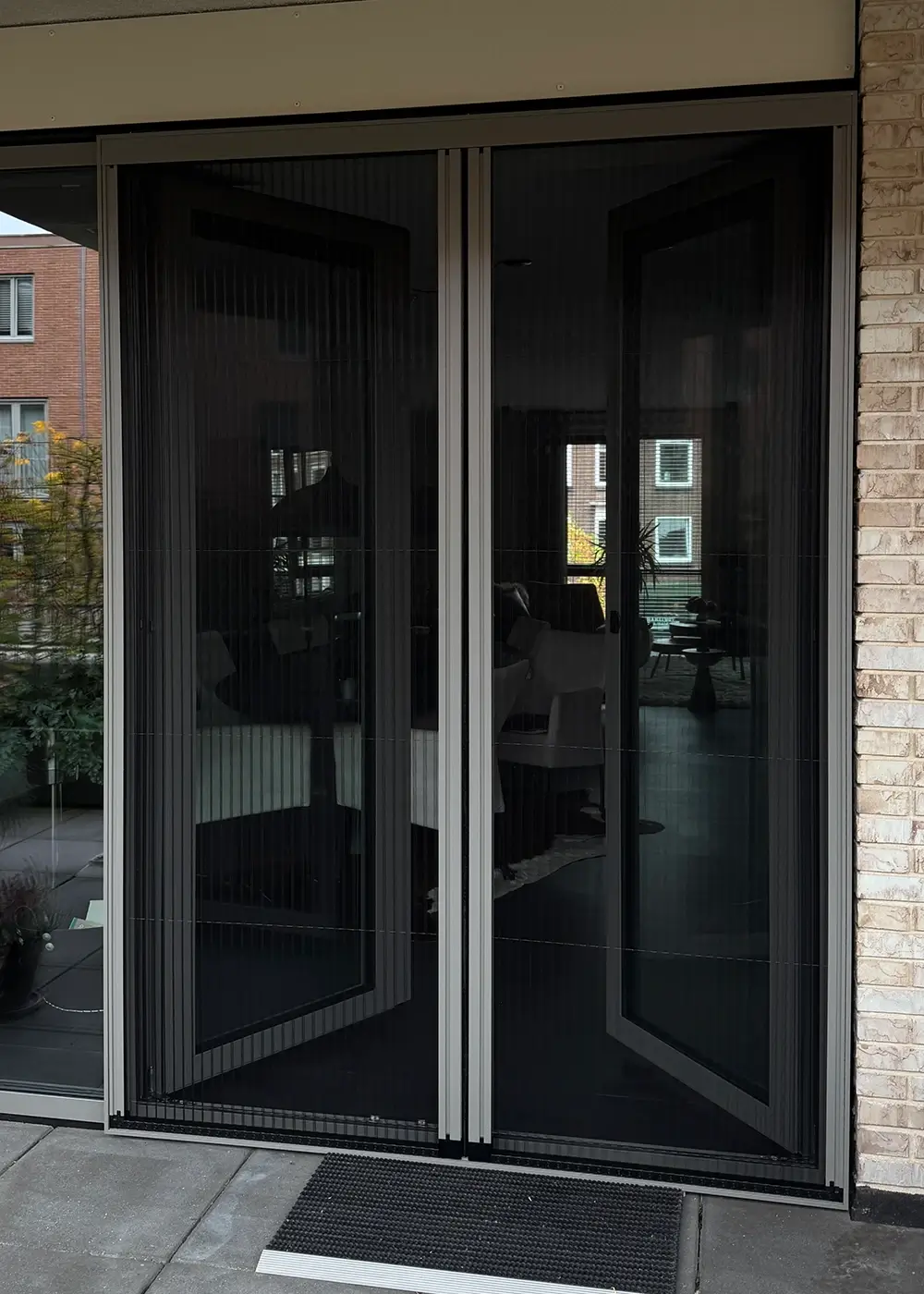 Dubbele plisse hordeur